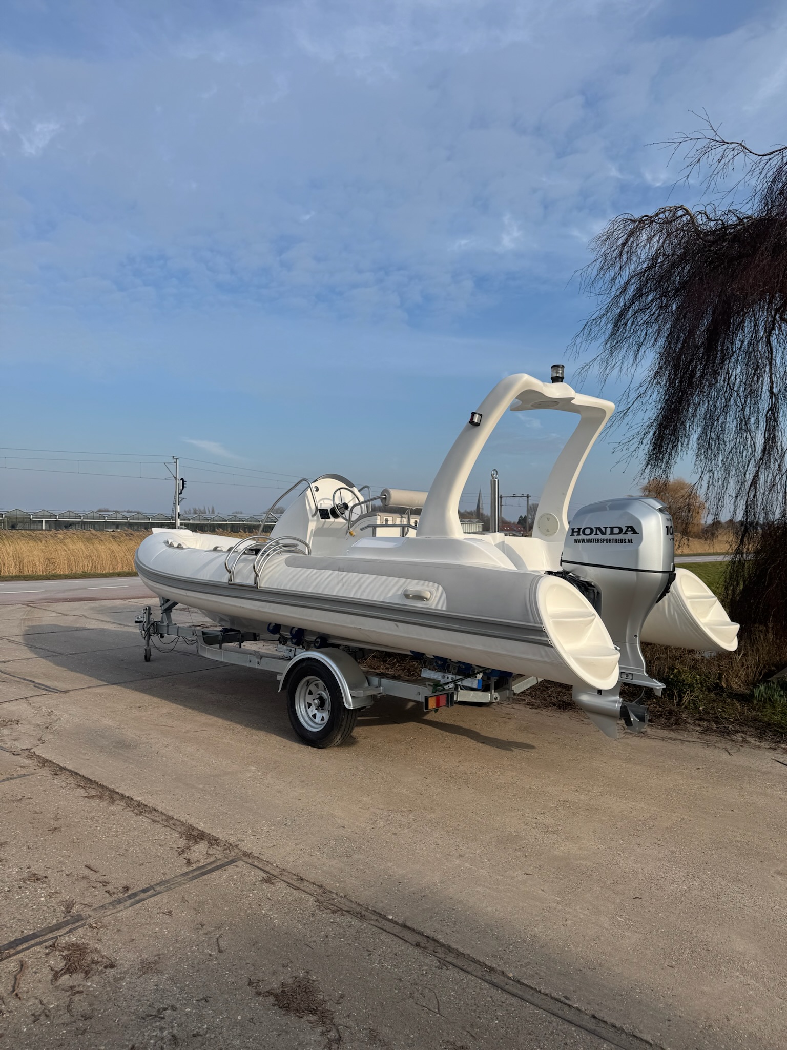 RIB 5,80 incl. 100 PK Honda en trailer